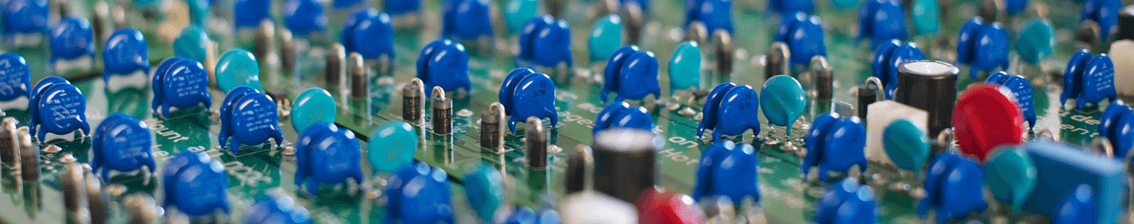 A close up of various components placed on a printed circuit board